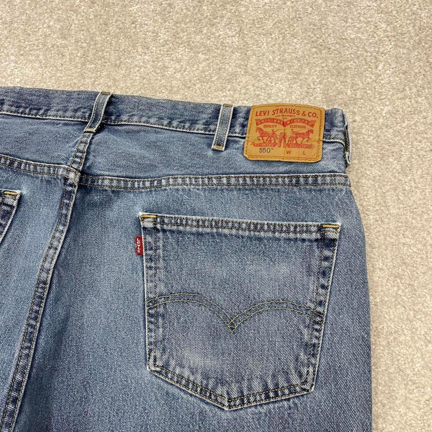 Y2K baggy Levi’s 550 jeans wide leg blue Loose relaxed fit denim pants red tab logo