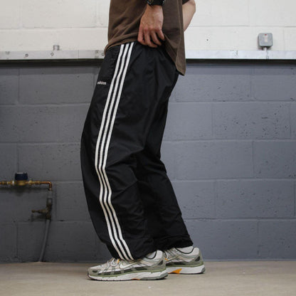 Adidas tracksuit bottoms loose black Loose floaty leg embroidered side stripe track pants