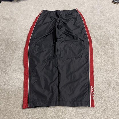 Vintage Nike baggy tracksuit bottoms Y2K black Wide leg lined embroidered side stripe track pants