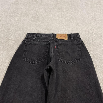Vintage Levi's 560 jeans loose fit tapered leg black USA made 100% cotton denim pants red tab logo