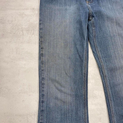 Blue Carhartt jeans size 12 (W34) traditional fit bootcut denim jeans patch logo