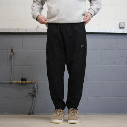 Nike Dri Fit Trackies XL black y2k 00s style loose leg joggers print logo