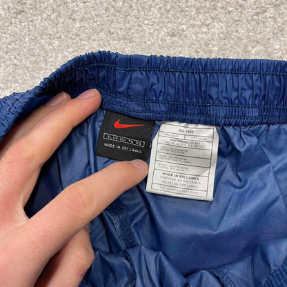 Vintage y2k Nike tracksuit bottoms navy blue Loose unlined embroidered box logo stripe track pants