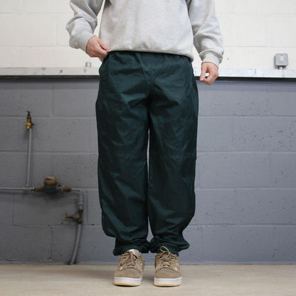 Green vintage Nike trackies Large loose y2k floaty leg joggers embroidered Swoosh logo shell suit