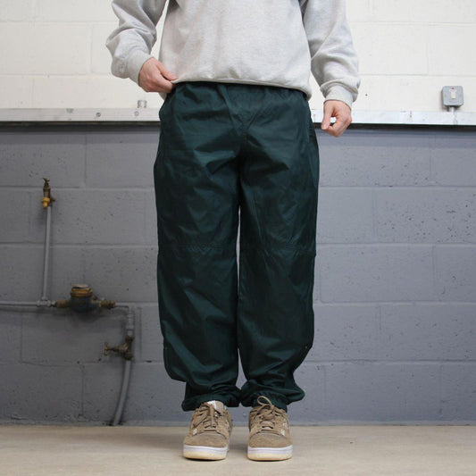 Green vintage Nike trackies Large loose y2k floaty leg joggers embroidered Swoosh logo shell suit