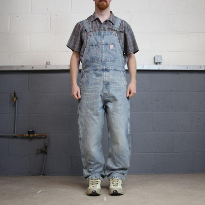 Vintage Levi’s red tab logo dungarees 00s denim overalls blue