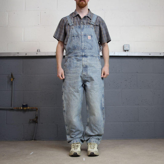 Vintage Levi’s red tab logo dungarees 00s denim overalls blue