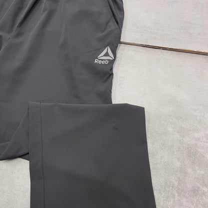 Grey Reebok trackies Large loose y2k floaty leg joggers print logo side stripe shell suit pants