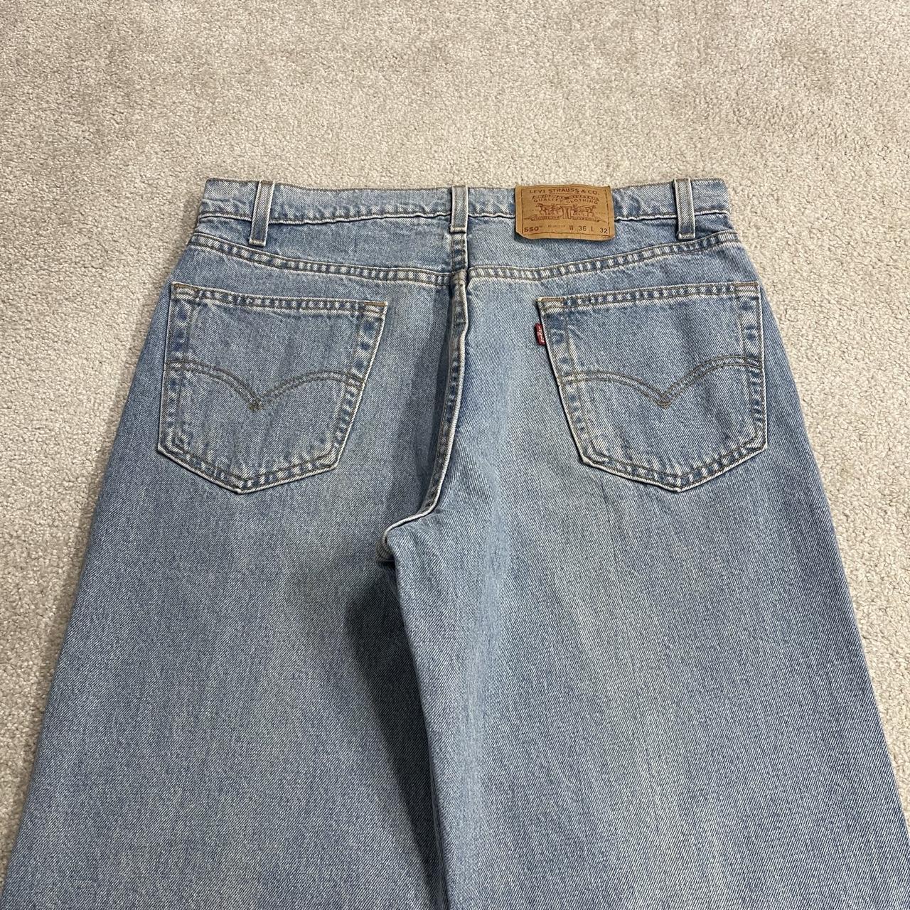 Vintage Levi’s baggy jeans y2k W34L32 washed blue Levi’s 550 relaxed fit surf style pants red tab