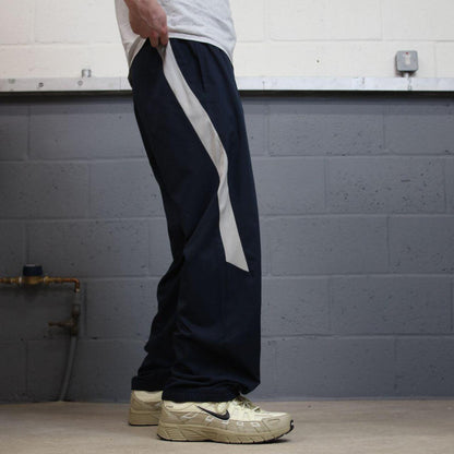 Nike tracksuit bottoms wide leg navy Floaty unlined embroidered side stripe track pants