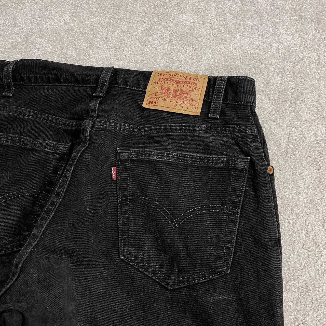 Vintage Levi's 560 jeans y2k black Loose fit denim pants red tab logo