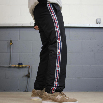Vintage Champion tracksuit bottoms y2k style black joggers embroidered side stripe track pants