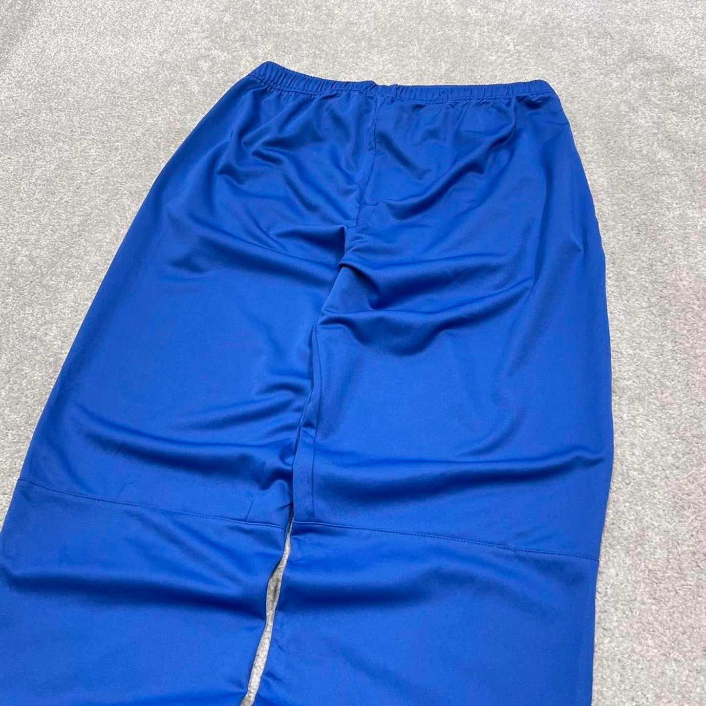 Vintage y2k Nike tracksuit bottoms blue Floaty swoosh logo running track pants