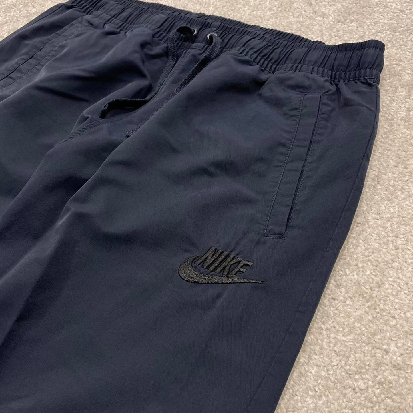 Y2k Nike tracksuit bottoms loose navy Loose unlined embroidered cuffed track pants