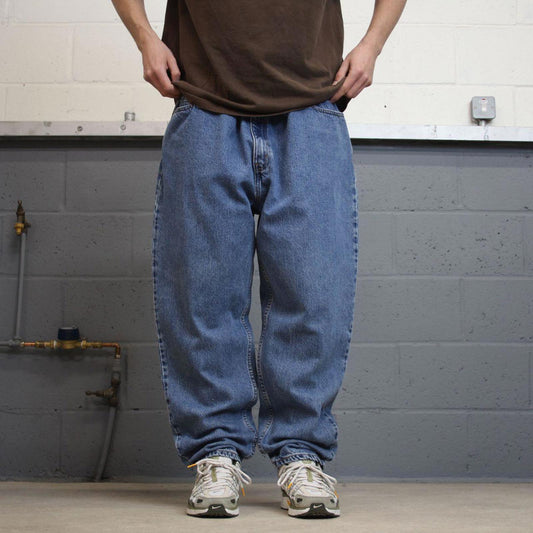 Y2K Levi’s 550 jeans tapered leg blue Loose relaxed fit denim pants red tab logo