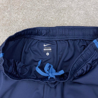 Baggy Nike Trackies Large Navy loose wide leg y2k style joggers embroidered logo side stripe design
