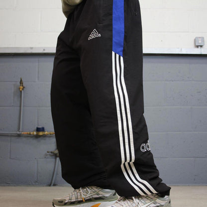 Vintage Y2K baggy Adidas tracksuit bottoms black Embroidered logo lined stripe track pants
