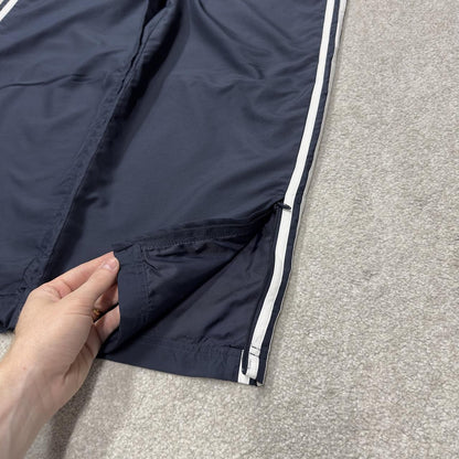 Baggy women’s Y2K Adidas tracksuit bottoms navy mesh lined side stripe embroidered logo track pants