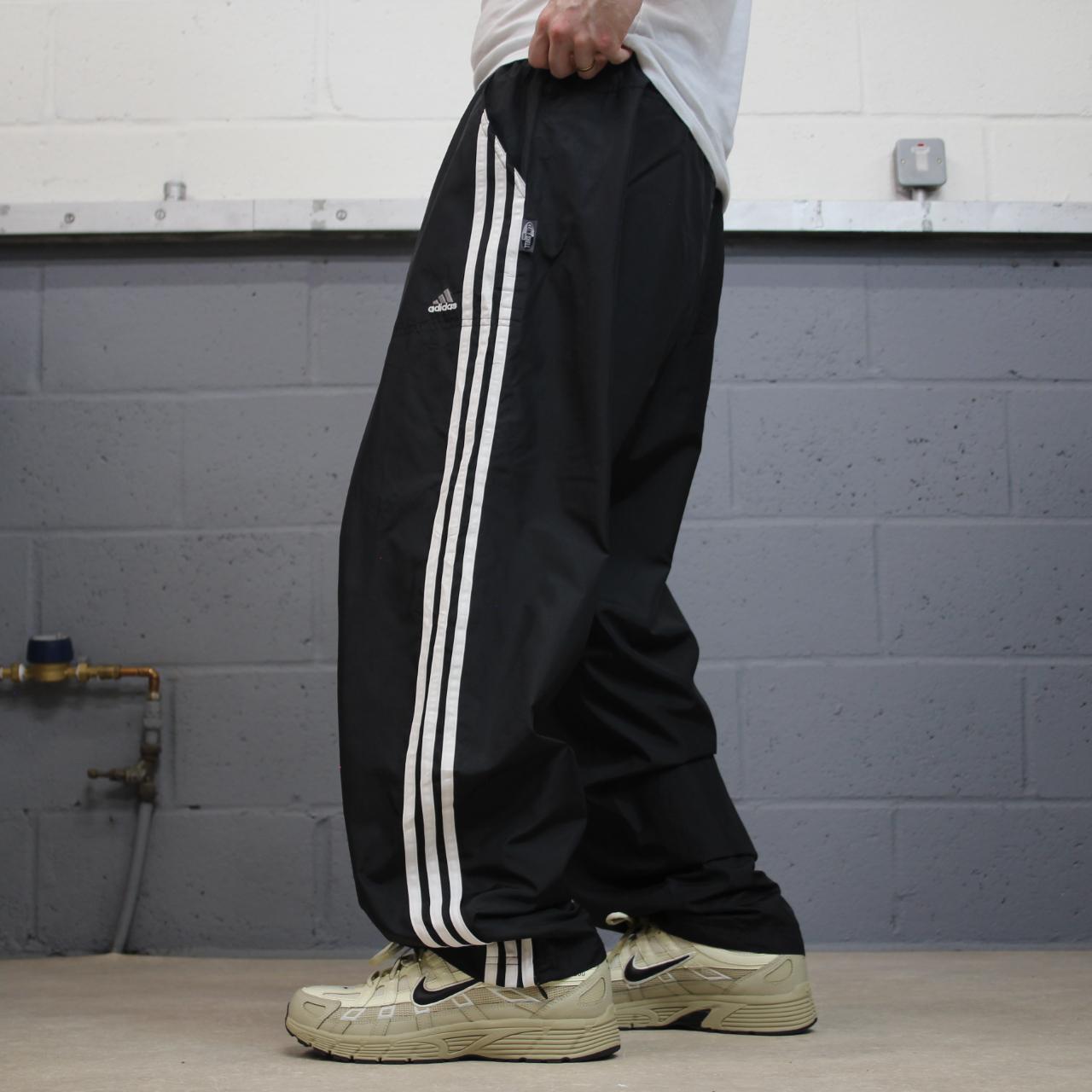 Vintage Adidas tracksuit bottoms loose black Loose floaty embroidered side stripe track pants