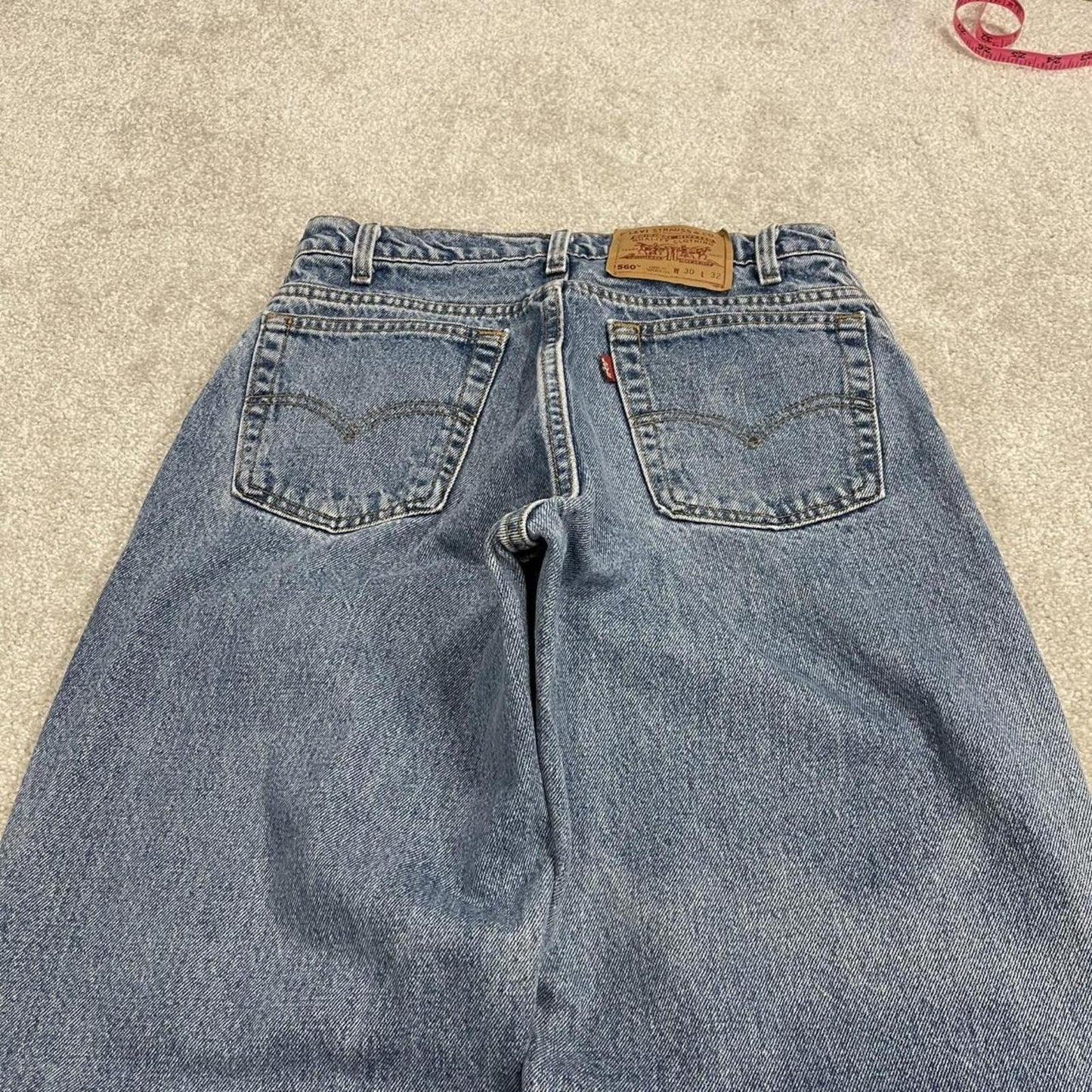 Vintage Levi's jeans 560 loose fit tapered leg blue USA made 100% cotton denim pants red tab logo