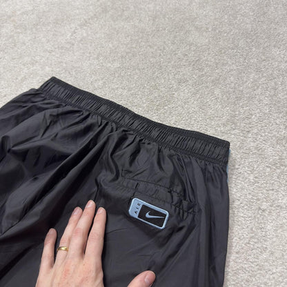 Y2K Nike baggy popper tracksuit bottoms black L swoosh logo side stripe track pants