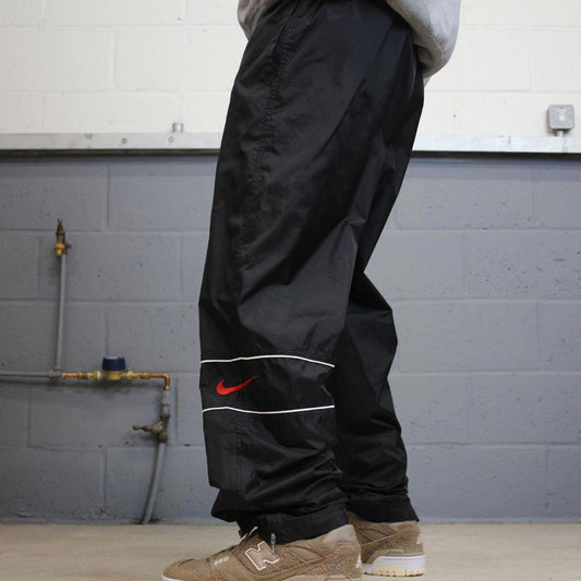 Vintage y2k baggy Nike tracksuit bottoms black Loose floaty unlined embroidered stripe track pants