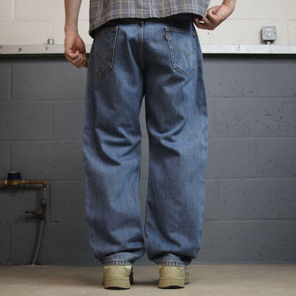 Levi’s 550 denim jeans y2k W36L30 blue loose straight leg red tab logo pants
