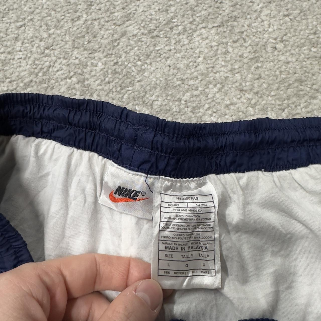 Y2K vintage Nike baggy tracksuit bottoms navy Loose leg 2000s style casual swoosh logo track pants