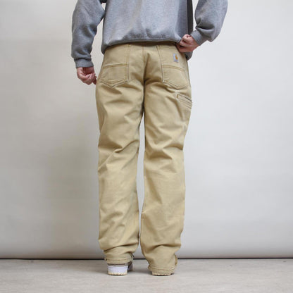 Cream Carhartt carpenter trousers W34L32 relaxed fit skater style pants