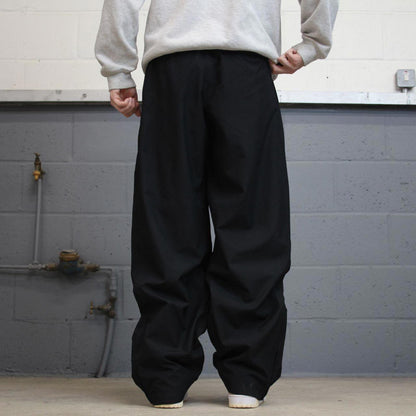 Baggy Nike Trackies L Black y2k 00s style wide leg joggers swoosh logo mesh lining
