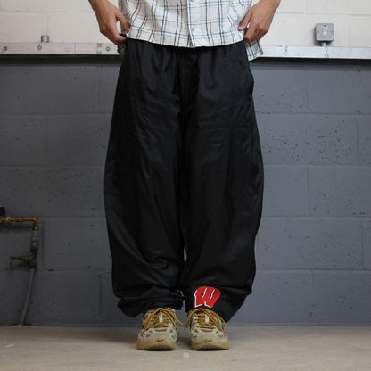 Champion baggy tracksuit bottoms black embroidered Loose mesh lined casual track pants