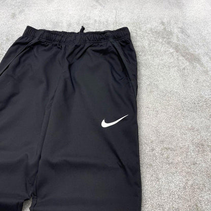 00s Nike tracksuit bottoms y2k S loose black joggers print Swoosh logo gym wear trackies