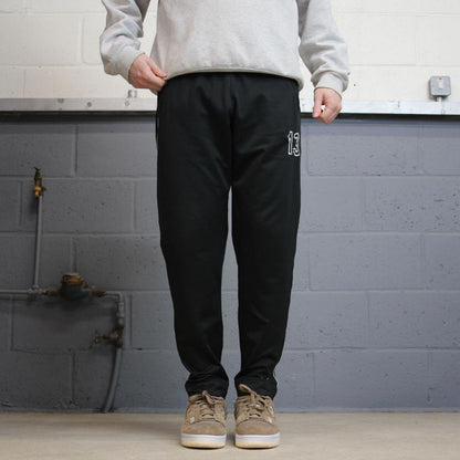 Black Nike trackies M 8-10 loose y2k floaty leg joggers embroidered logo