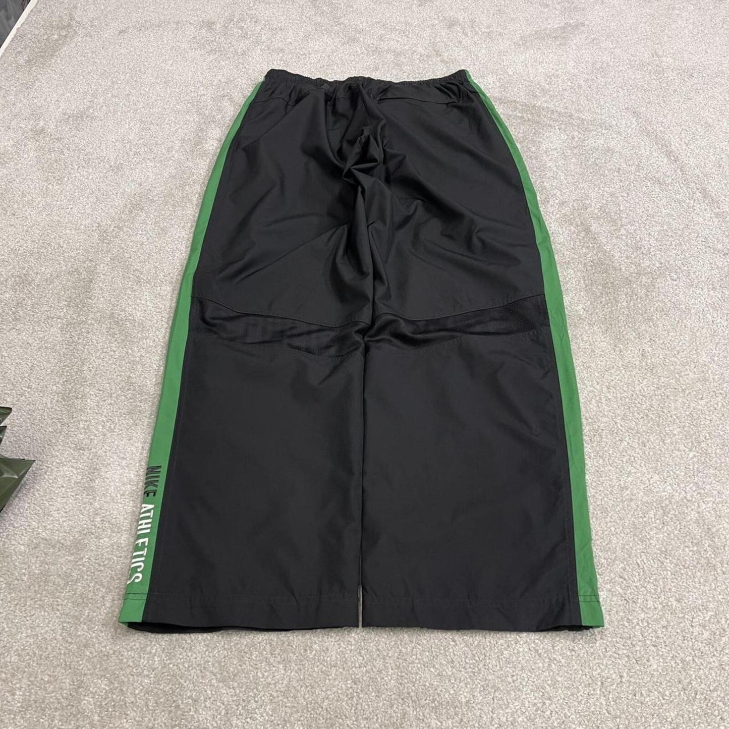 Vintage baggy Nike tracksuit bottoms black Wide leg mesh lined embroidered side stripe track pants