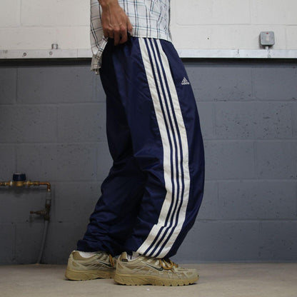 Vintage Adidas Team tracksuit bottoms navy Loose baggy y2k embroidered lined side stripe track pants