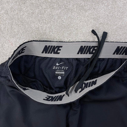 Nike Trackies XL Grey y2k 00s style loose leg joggers print logo fleece lined