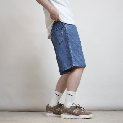 Vintage mens Levi’s 550 jorts W34 blue denim loose 90s style skater shorts