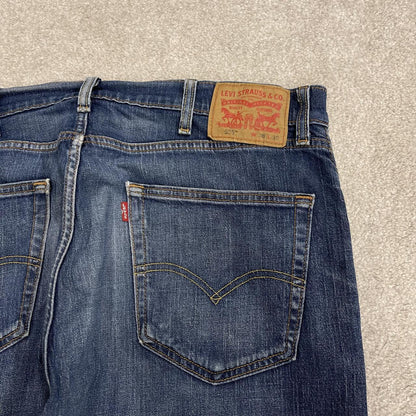 Y2K Levi’s 505 jeans straight leg faded blue Straight fit 5 pocket pants belt loops red tab logo