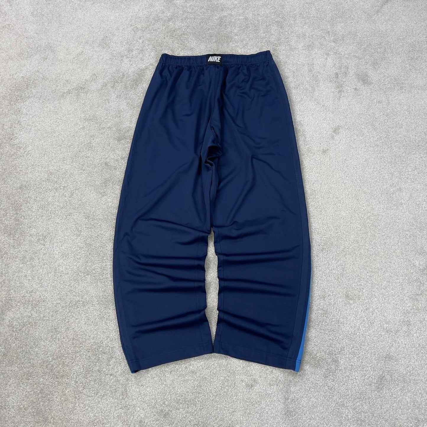 Baggy Nike Trackies Large Navy loose wide leg y2k style joggers embroidered logo side stripe design