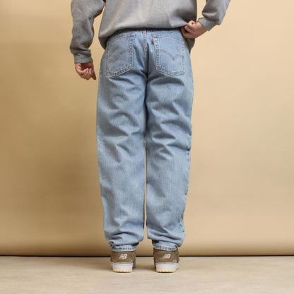 Blue Levi's 550 jeans size 12 (W30L33) relaxed fit taper leg denim jeans