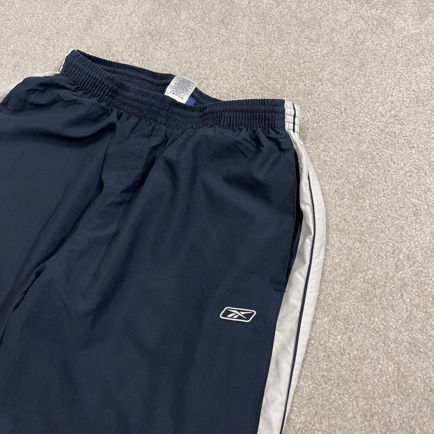 Baggy Reebok tracksuit bottoms vintage wide leg navy Loose embroidered side stripe track pants
