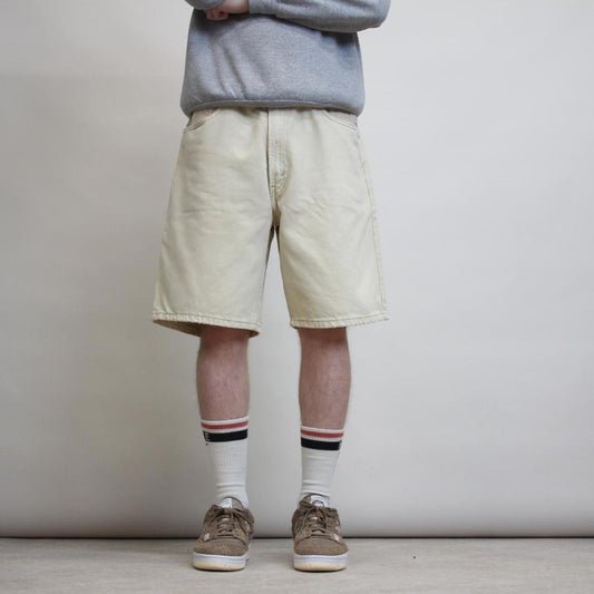 Beige Levi's 550 jorts W36
