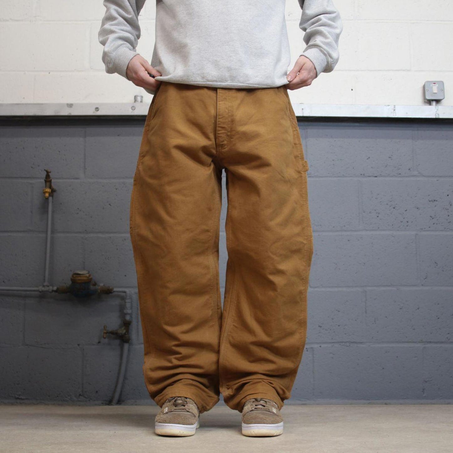 Vintage baggy Carhartt carpenter jeans tan 90s skater style W34L32 flannel lined carpenters