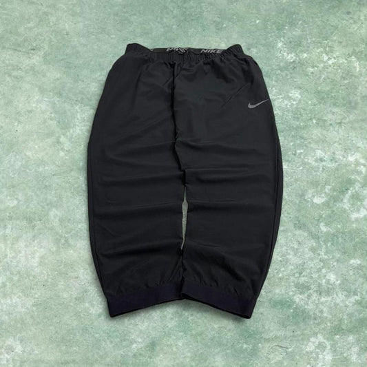 Nike tracksuit bottoms loose fit black Lightweight floaty swoosh logo track pants