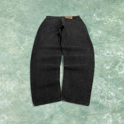 Vintage Levi's 560 jeans loose fit tapered leg black USA made 100% cotton denim pants red tab logo