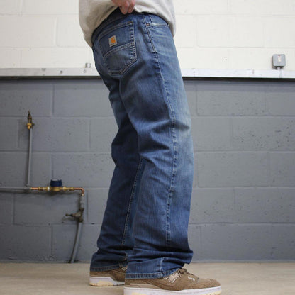 Vintage blue Carhartt jeans W36L32 relaxed denim 90s style skater jeans patch logo