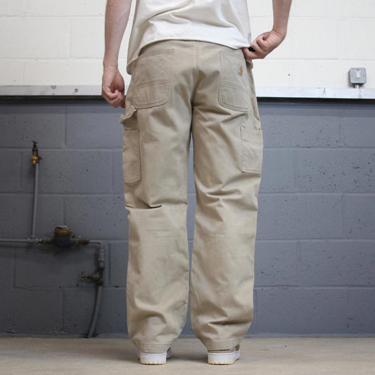 Beige Carhartt carpenter pants W36L30