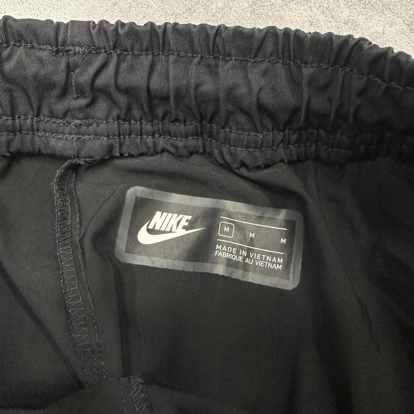 Black Nike Trackies M loose track pants print logo