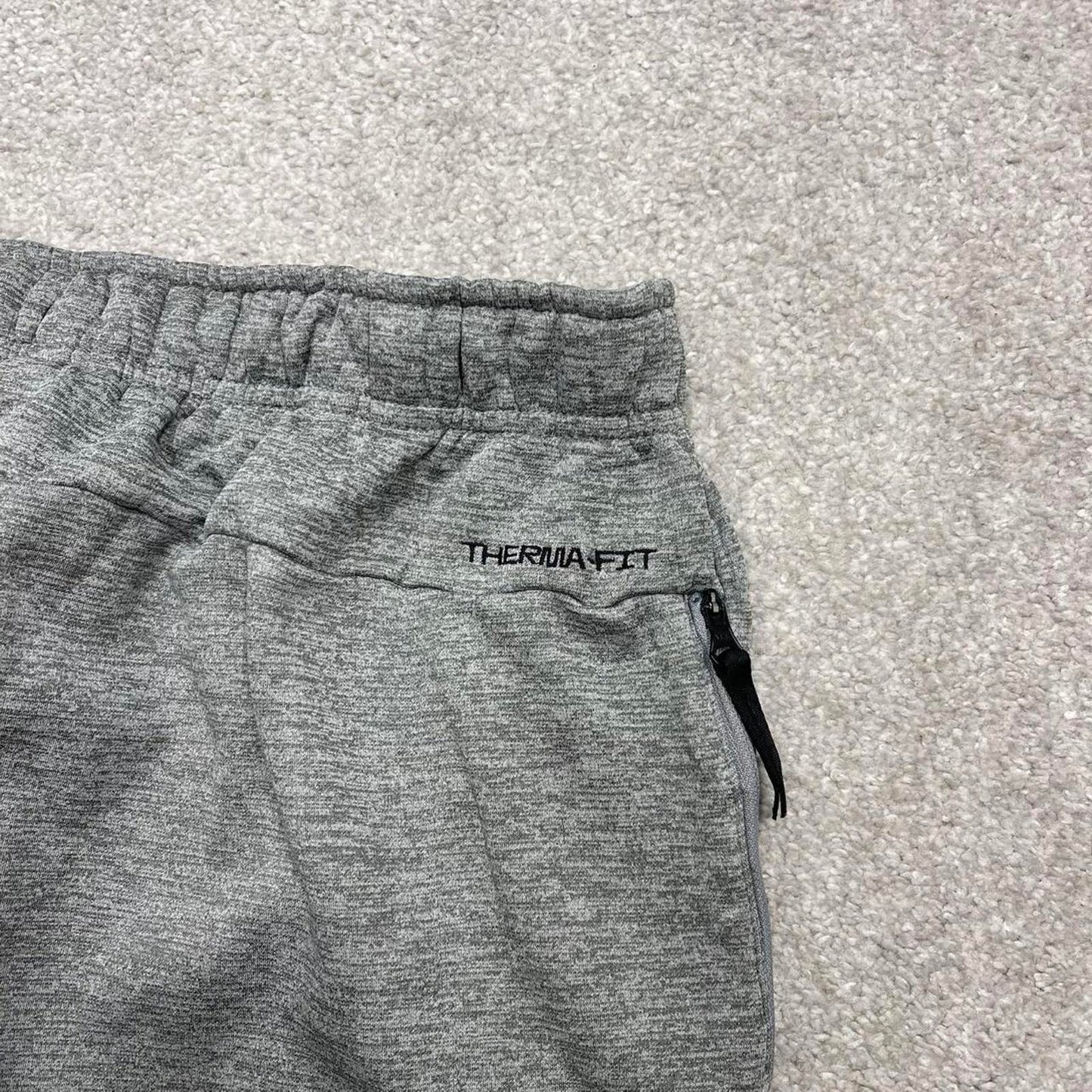 Y2K Nike loose sweatpants joggers grey Swoosh logo fleece lined gym drawstring track pants
