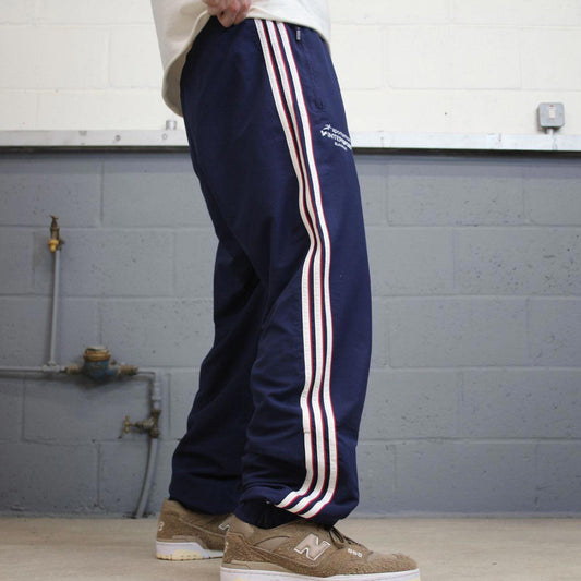 Navy Adidas trackies L y2k style sportswear track pants embroidered logo side stripe design